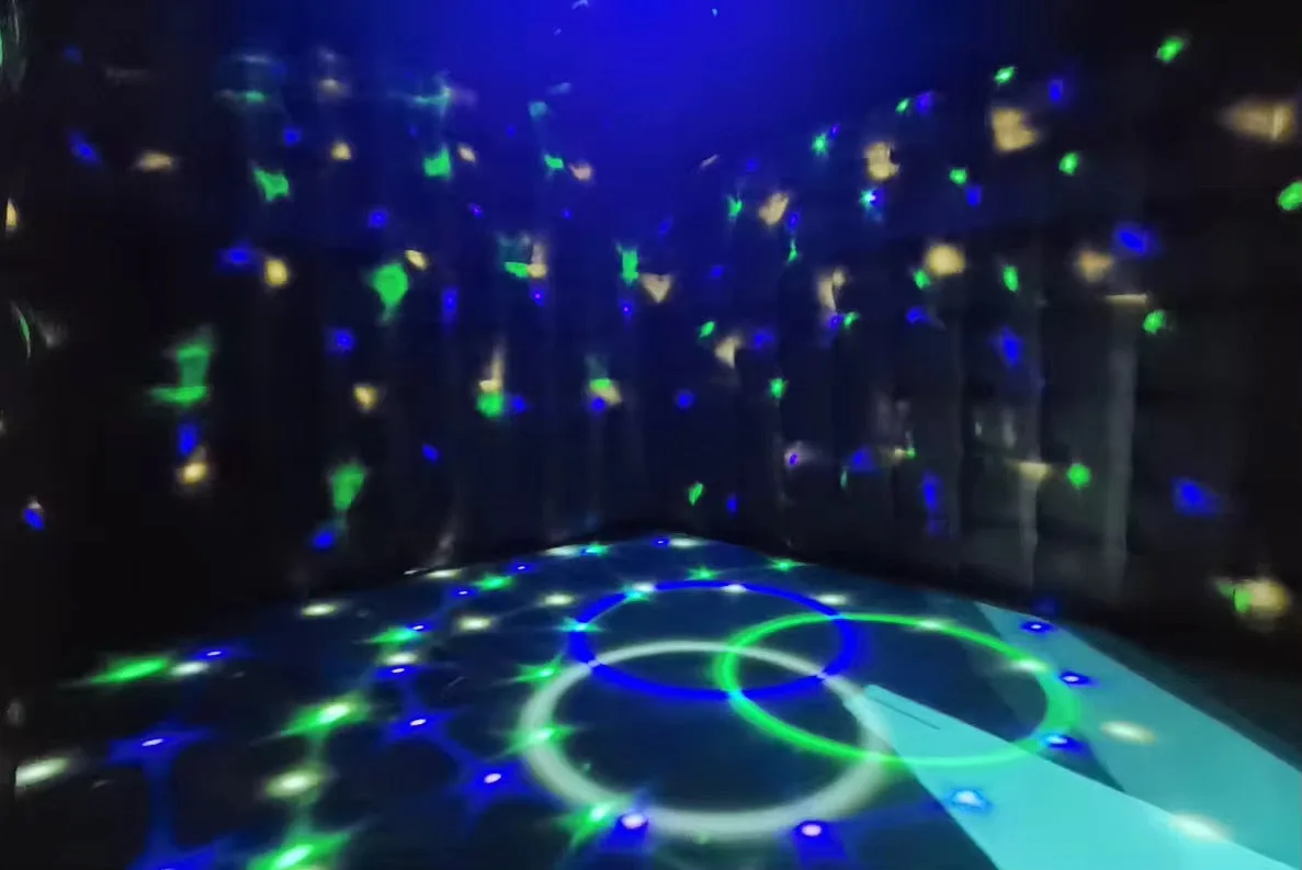 Inside an inflatable nightclub with coloured disco lights